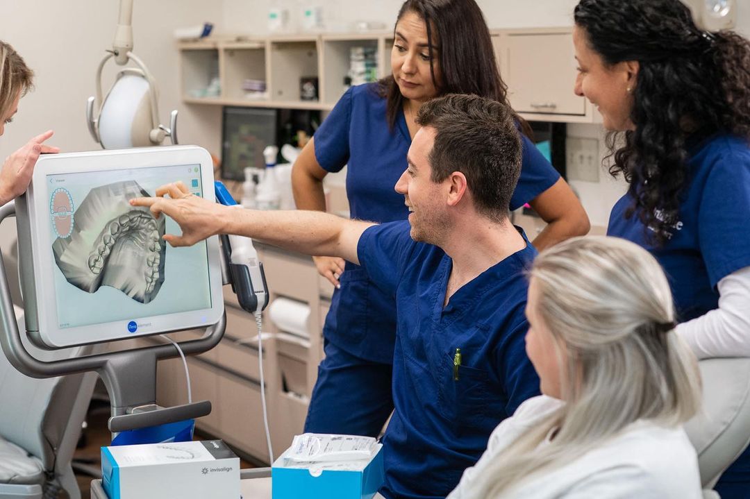 Dr. John Scalia orthodontist with his team